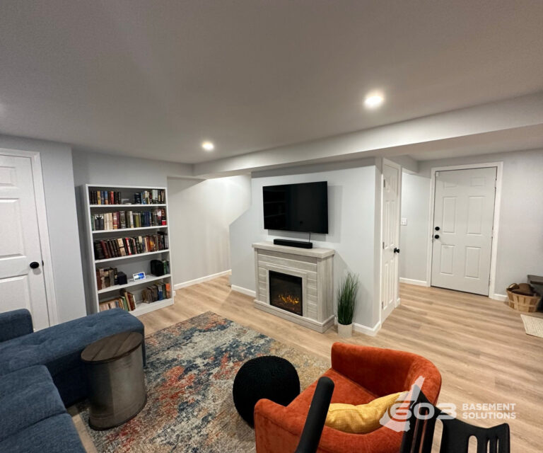 Completed basement living space finished by 603 Basement Solutions
