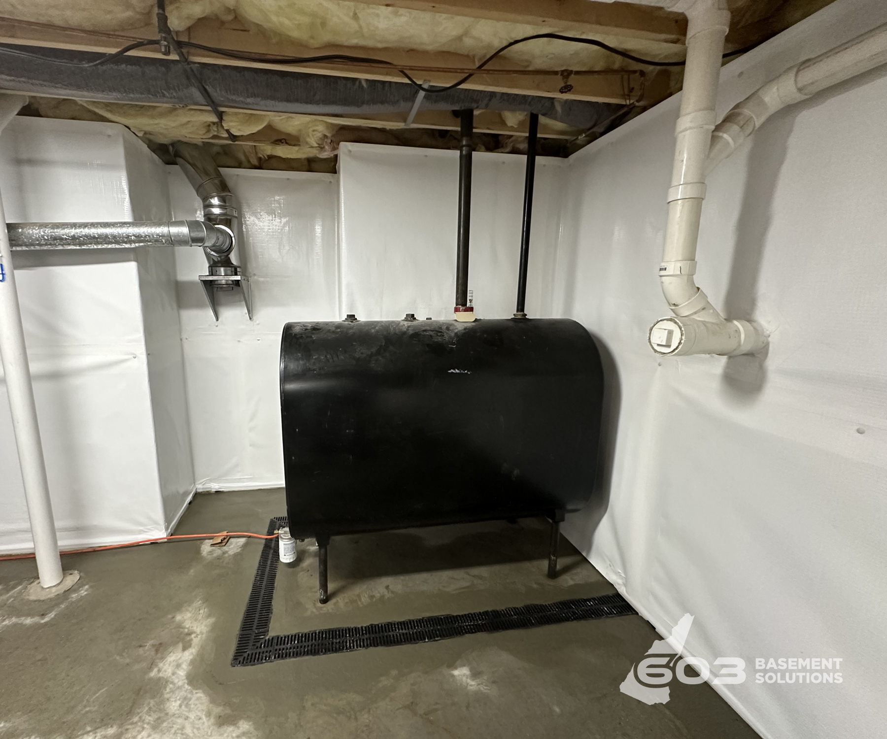 Completed basement waterproofing project by 603 Basement Solutions in New Hampshire