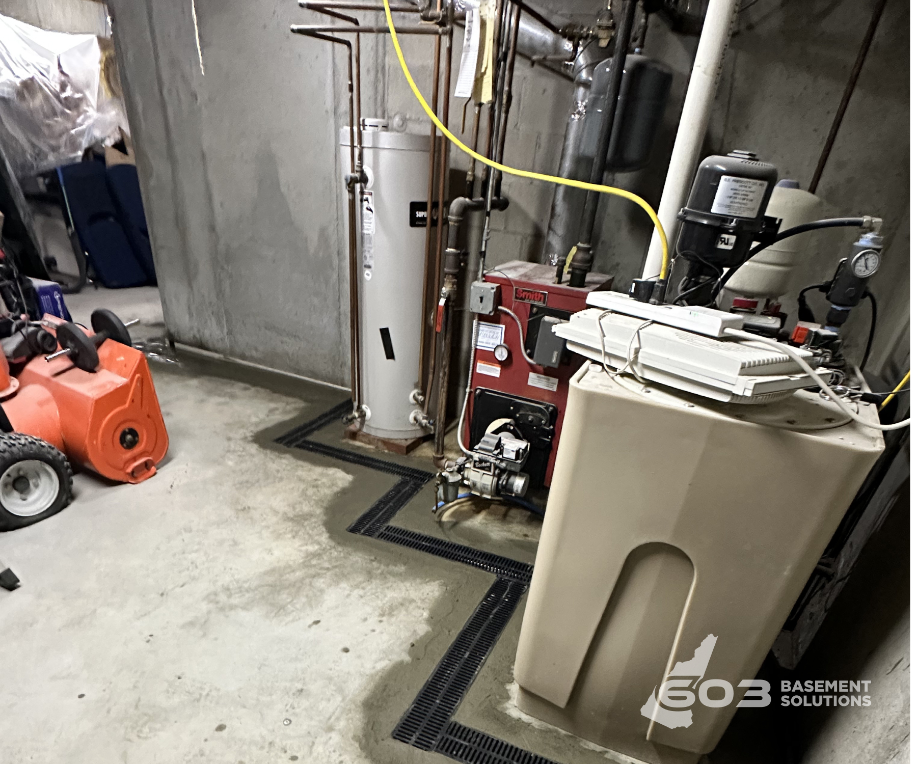 Completed basement waterproofing project by 603 Basement Solutions in New Hampshire